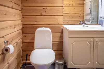 a bathroom with a toilet and a sink at Lisetra 716A in Trysil