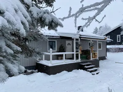 a house covered in snow with a porch at Family house in Hemsedal in Hemsedal