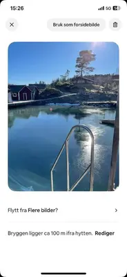 a screenshot of a picture of a river with a bridge at Litla Hyttå, Mosterhamn Bømlo in Mosterhamn