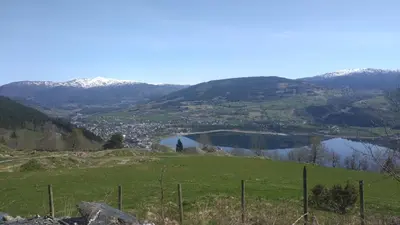 a view of a valley with mountains and reservoirs at Koselig hus med flott utsikt in Vossevangen