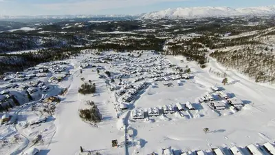 an aerial view of a ski resort covered in snow at Bjarnebu - 4 bedroom cabin in Rauland in Rauland