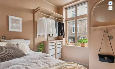 a bedroom with a bed and a window at The best place to stay in city center - close to everything in Bergen