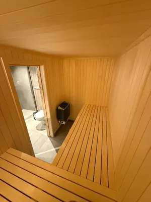 a small sauna with a bench in the middle at Exclusive cabin with sauna and mountain view in Geilo in Hol