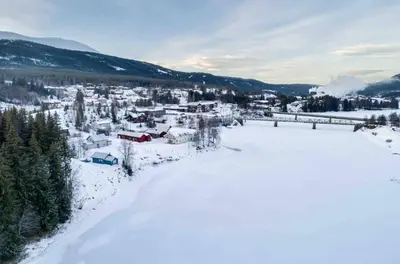 an aerial view of a town covered in snow at The Blue Cabin in Trysil