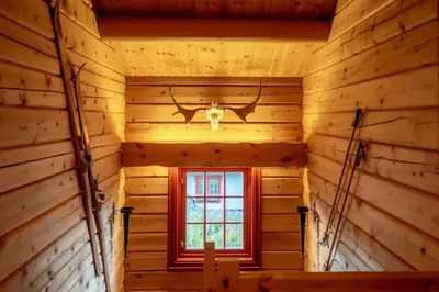 an inside view of a log cabin with a window at Lisetra 716B in Trysil