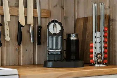 a kitchen counter with a food processor and utensils at Charming Cabin By Nesfjellet Ski Resort in Nesbyen