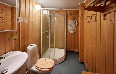 a bathroom with a shower and a toilet and a sink at 3 Bedroom Stunning Home In Sør-Fron in Sør-Fron
