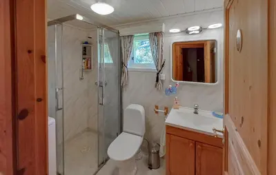 a bathroom with a shower and a sink at Stunning Home In Korssund With Wifi in Korssund
