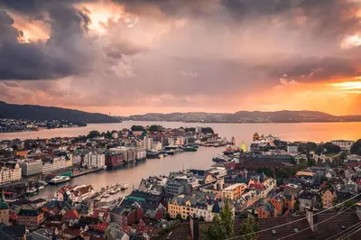 a view of a city with a river and buildings at Modern Apartment in the Heart of Bergen in Bergen