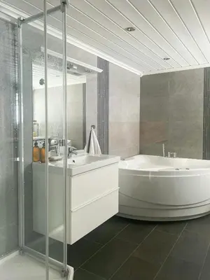 a bathroom with a tub and a sink and a shower at Family Cabin By The Ski Trails In Rauland in Seljord