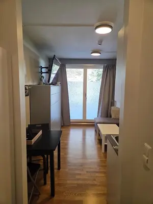 a living room with a table and a couch at 