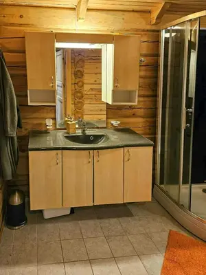 a bathroom with a sink and a shower at Family Cabin With Views Towards Solentoppene in Nymoen