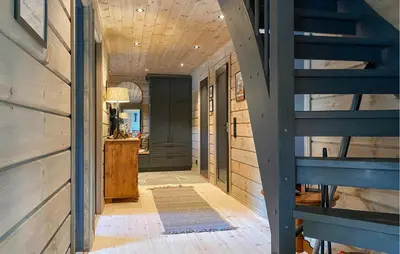 a hallway with a staircase in a house at 3 Bedroom Beautiful Home In Lesjaverk in Bjorli