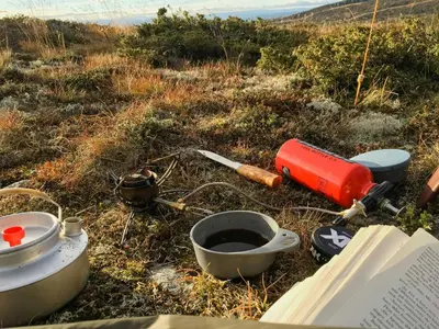 a bunch of items sitting on the ground in a field at Cosy Cabin By Golsfjellet Ski Resort in Gol