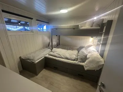 a small room with two bunk beds in it at Hovden Alpin Apartments in Bykle
