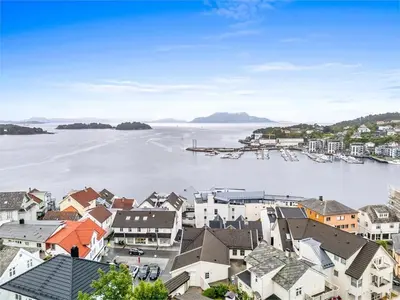 an aerial view of a town with a body of water at 28 sqm studio apartment in the heart of Leirvik in Stord
