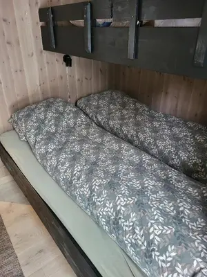 a bed in the back of a trainruck at Kvamsfjellet - Rondane in Nord-Fron
