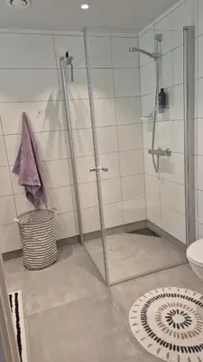 a bathroom with a shower with a glass door at Apartment in Ålesund in Ålesund