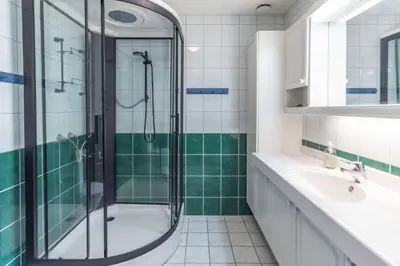 a bathroom with a shower and a sink at Bakkebyvegen 7A in Trysil