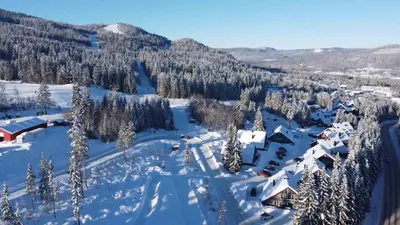 an aerial view of a resort in the snow at Bakkebyvegen 13B in Trysil