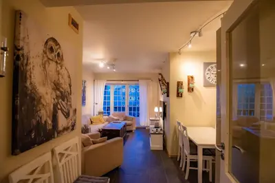 a living room with a couch and a table at Høyfjellsgrend 961, 36b in Trysil