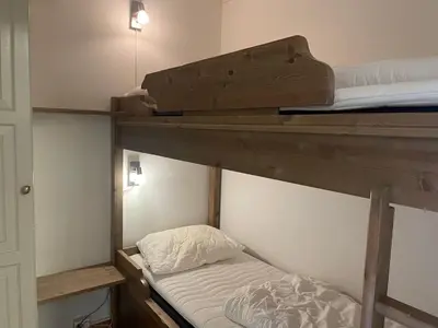 a couple of bunk beds in a room at Leilighet For 4 I Sentrum in Beitostøl