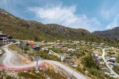 an aerial view of a village in the mountains at Family-Friendly Ski in-Ski out Retreat by Skarsnuten in Hemsedal