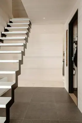 a staircase in the hallway of a house at New Cabin With Panoramic Views At Hardangervidda in Eidfjord