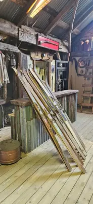 a pile of surfboards on display in a room at Retro & Vintage Camping in Vaksdal