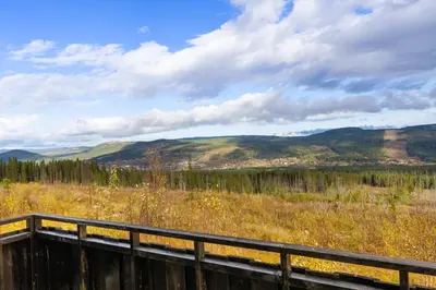 a view of a field with mountains in the background at Mosetra2038 by Vacationtrysil in Trysil