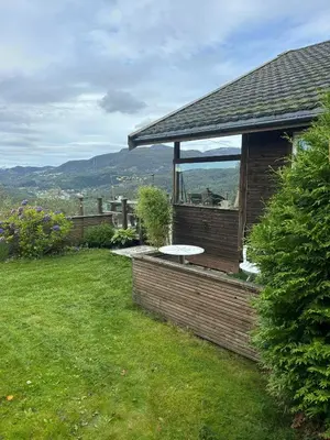 a house with a large window on the side of it at Modern Cabin With Panoramic Views In Aukland in Jelsa