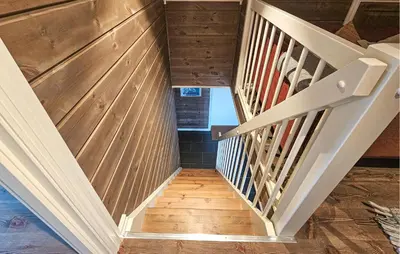 a staircase in a house with a american flag at Stunning Home In Torpo With Wifi in Torpo