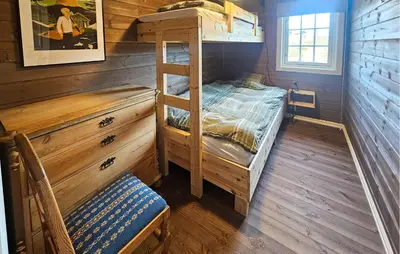 a bedroom with a bunk bed in a cabin at Stunning Home In Torpo With Wifi in Torpo