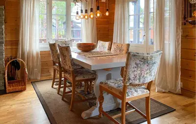 a dining room with a table and chairs at Gorgeous Home In Bjorli With Wifi in Bjorli