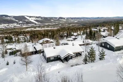 an aerial view of a house covered in snow at Trysilfjell 615 by Vacation Trysil in Trysil