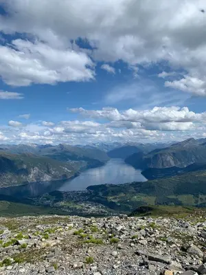 a view of a lake from the top of a mountain at Nikolaisens Nordic Panorama hideaway in Stranda