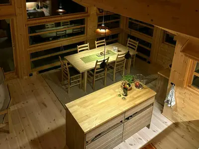 an overhead view of a table and chairs in a cabin at Ål Cabin With Views Of Marshland And Mountains in Flå