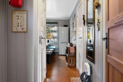 a hallway of a house with a refrigerator at Fageråsen 209 by Vacation Trysil in Trysil