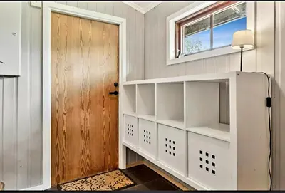 a room with a door and a shelf and a door at Filefjellhytta ved Tyin og Jotunheimen Ski in og ski out til alpinanlegg og skiløyper in Tyinkrysset