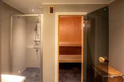 a bathroom with a shower and a walk in shower at Trysilfjellet Nord 985A in Trysil