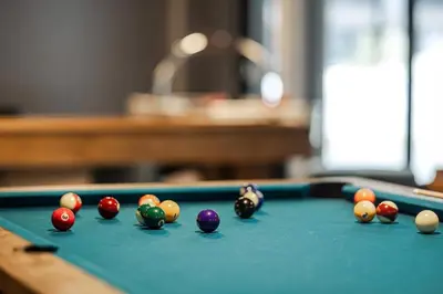 a group of billiard balls on a pool table at Brand new luxury apartment by the slopes, Hemsedal in Hemsedal