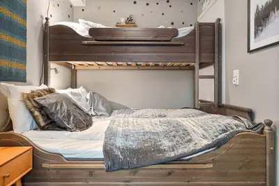 a bedroom with two bunk beds in a room at Fageråsen 963 by Vacation Trysil in Trysil