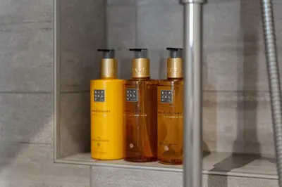 four bottles of honey sitting on a shelf at Mountain Chalet 958 by Vacation Trysil in Trysil