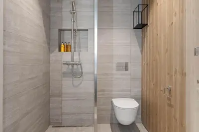 a bathroom with a toilet and a shower at Mountain Chalet 958 by Vacation Trysil in Trysil