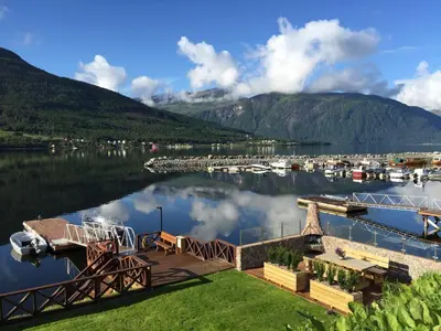 a view of a body of water with a dock at Solstrand Fjord Holiday in Eidsvåg