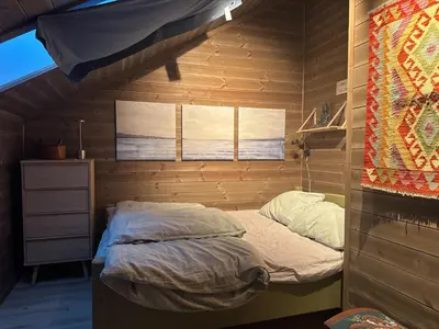 a small bedroom with a bunk bed in a house at Moderne leilighet på Glomsrud Golsfjellet vest in Gol