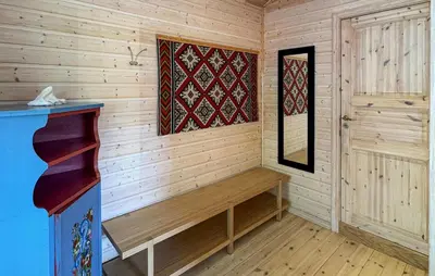 a room with a wooden wall with a bench at 1 Bedroom Cozy Home In Førde I Hordaland in Erve