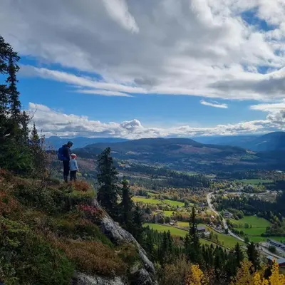 a man and a child standing on top of a mountain at Rent your own Boutiqe hotel in Skammestein