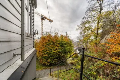 a porch of a house with a window and a hand rail at Bergen Villa - Charming 3 Bedroom with Views! in Bergen