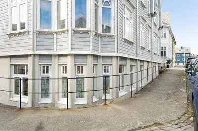 a building with windows on the side of it at Central apartement in Kristiansund in Kristiansund